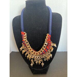 Red and blue wrapped with gold geometric and chain bib necklace